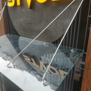 Скляні козирки та навіси над входом